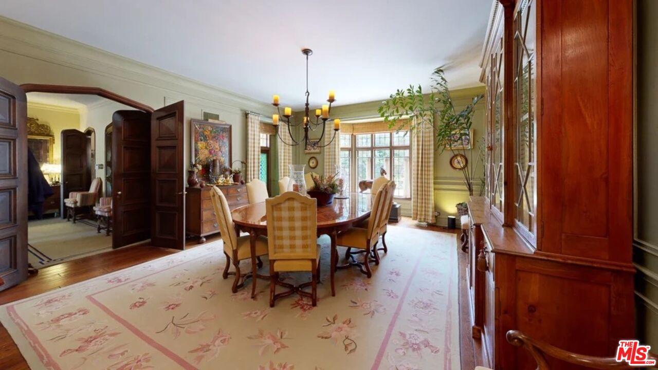 570 South Mapleton Drive Los Angeles, CA 90024 - Photo 21 of 23 a dining room with furniture window and wooden floor