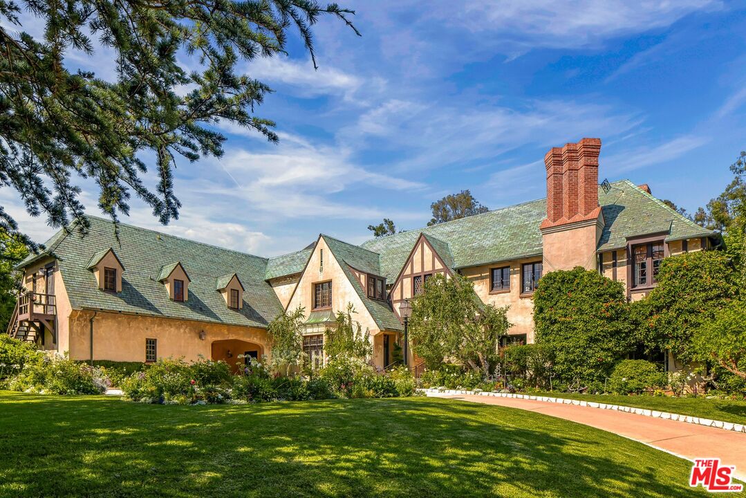 570 South Mapleton Drive Los Angeles, CA 90024 - Photo 3 of 23 a front view of house with yard and green space
