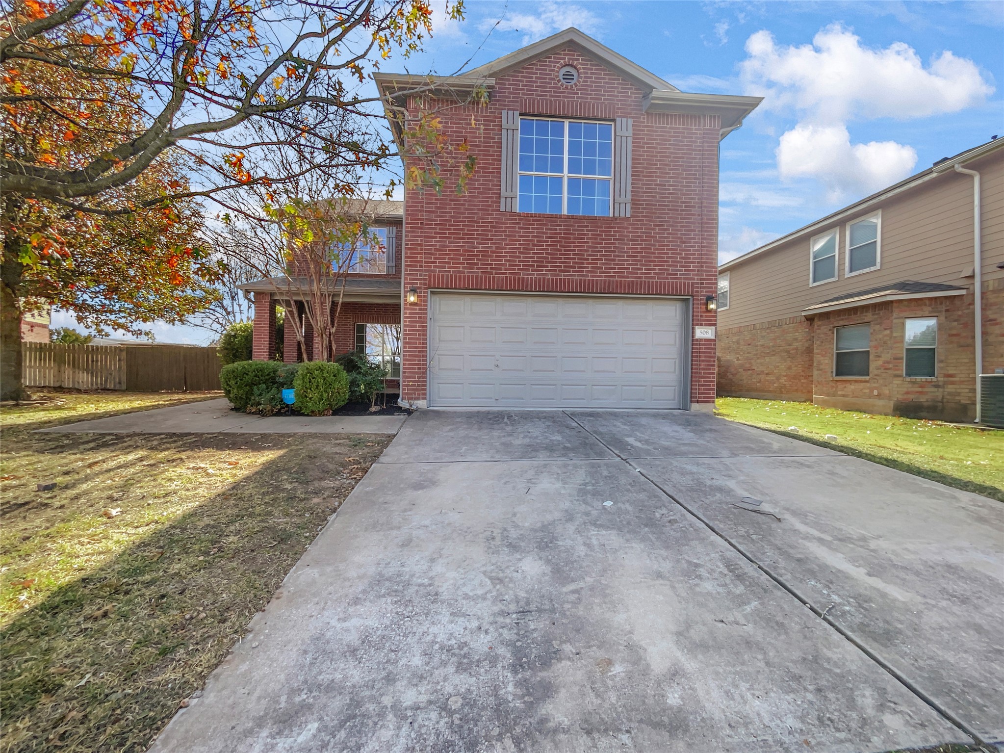 508 Friendship Cove Leander, TX 78641 - Photo 1 of 1 a front view of a house with a yard and garage