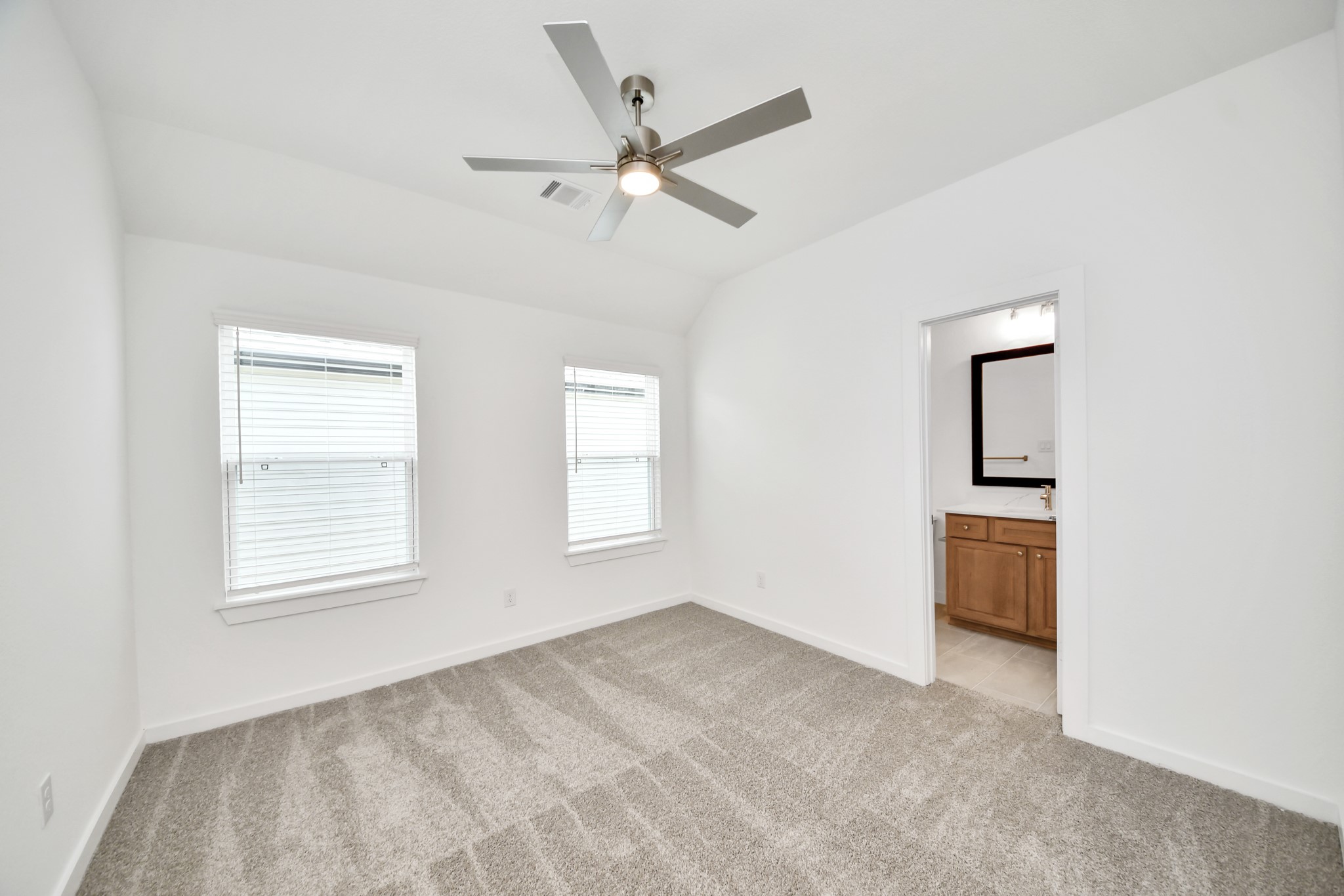 3102 Native Spg Drive Spring, TX 77373 - Photo 39 of 47 Generously sized secondary bedrooms featuring spacious closets, soft and inviting carpeting underfoot, large windows allowing plenty of natural light, and the added touch of privacy blinds for your personal retreat.