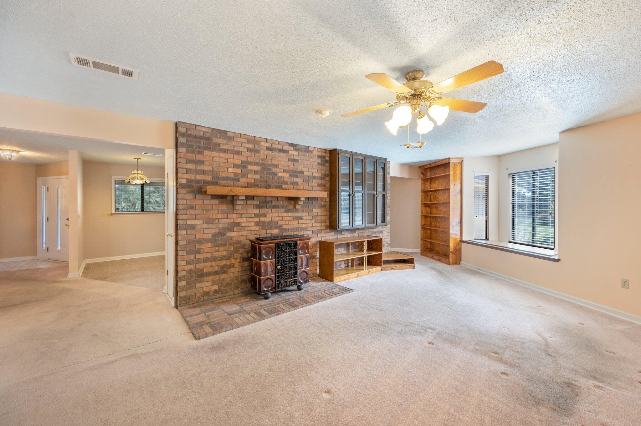 207 Shell Drive Crestview, FL 32536 - Photo 19 of 44 Wood burning stove