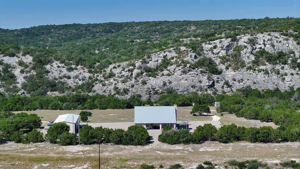 an aerial view of a house with a garden