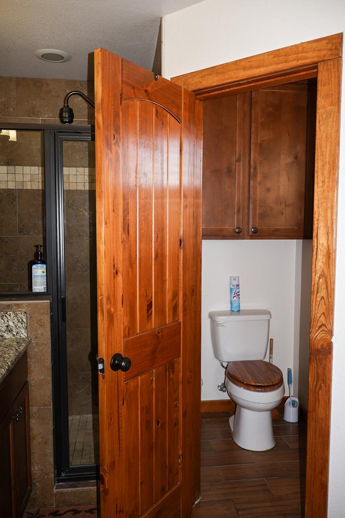 2970 Rr 2523 Del Rio, TX 78840 - Photo 19 of 28 a bathroom with a toilet and a shower