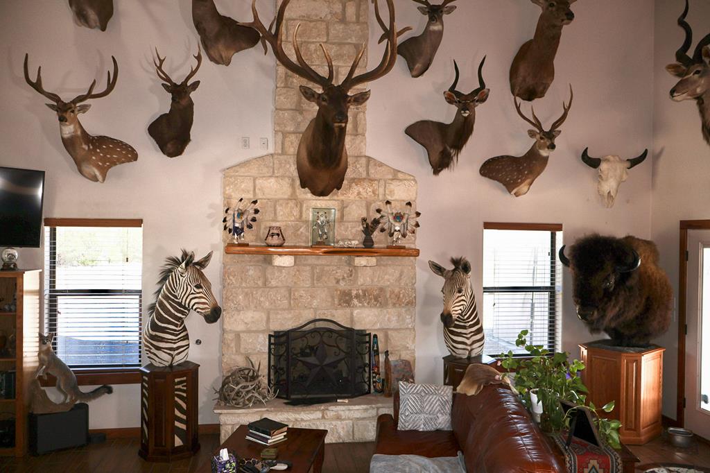 2970 Rr 2523 Del Rio, TX 78840 - Photo 4 of 28 a living room with furniture and a fireplace
