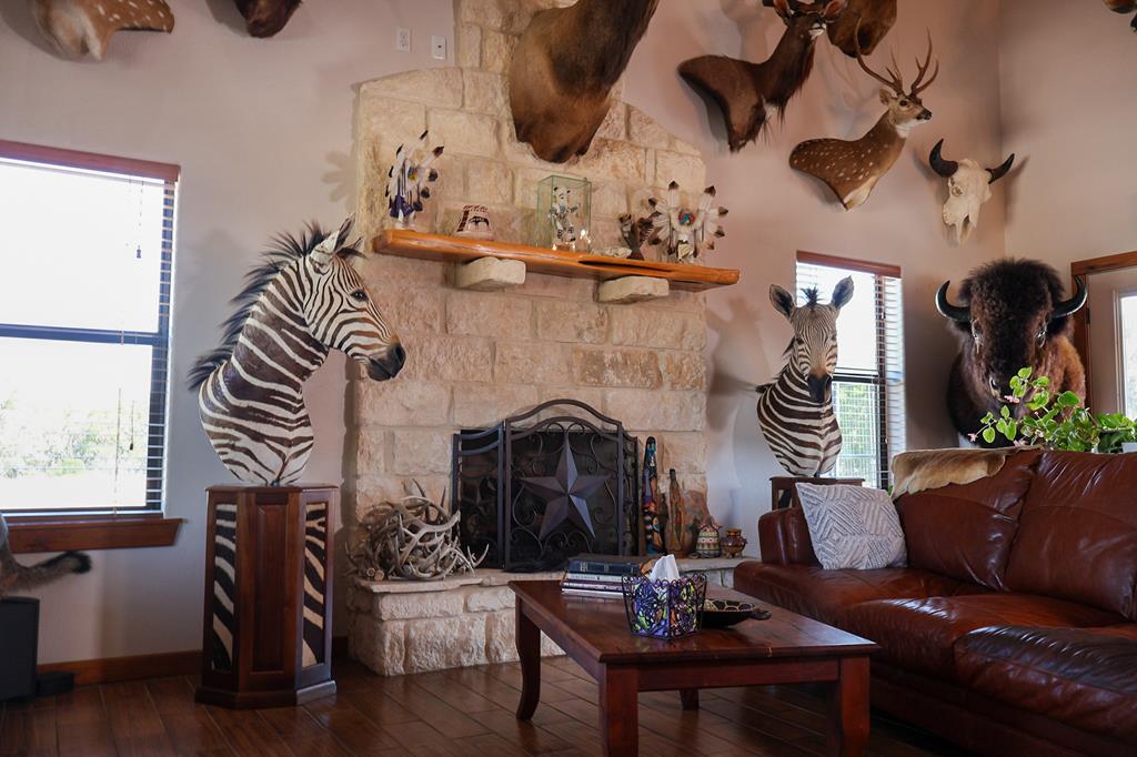 2970 Rr 2523 Del Rio, TX 78840 - Photo 5 of 28 a living room with furniture and a fireplace