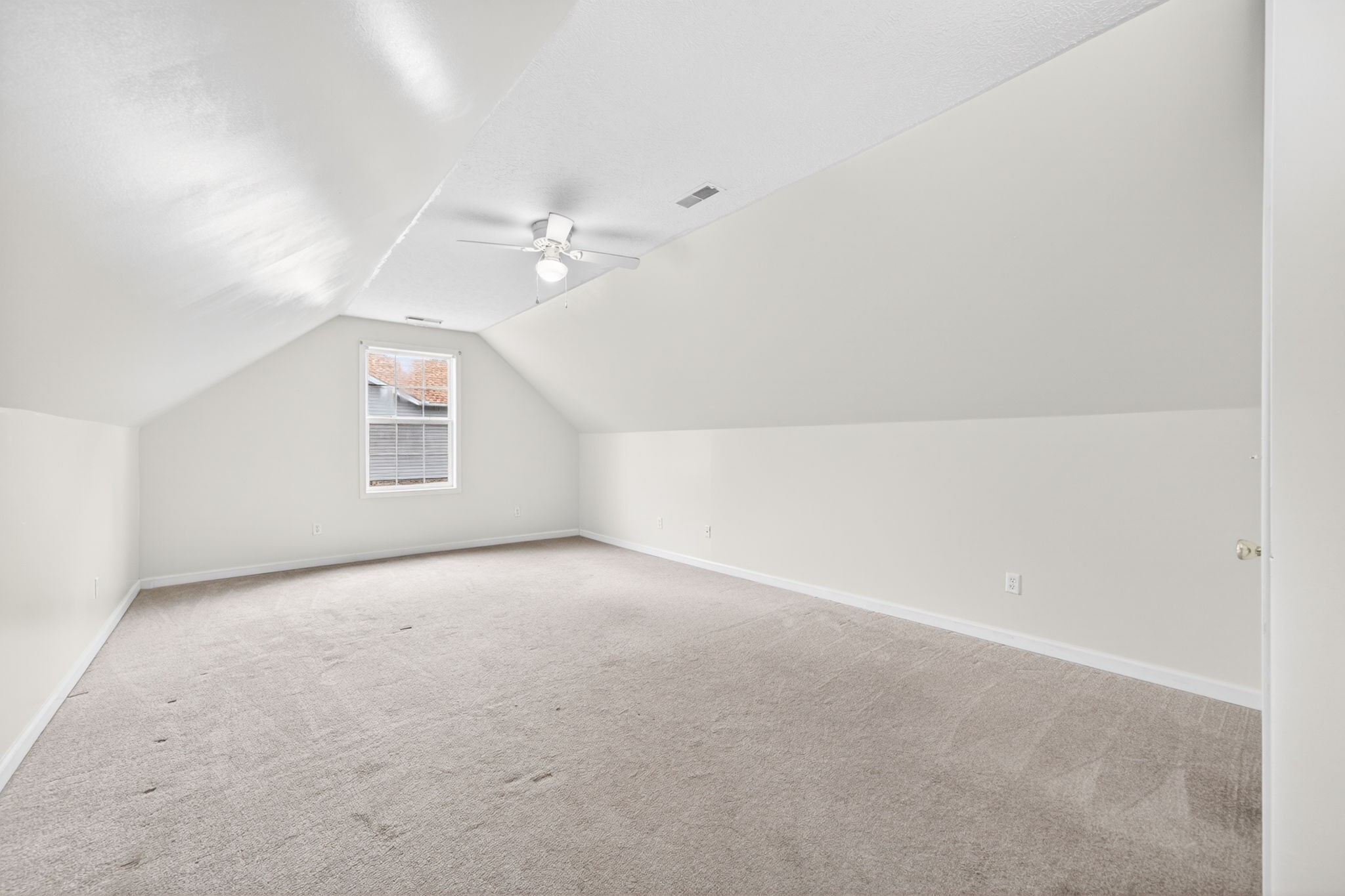 291 Poplar Point Lane Rickman, TN 38580 - Photo 25 of 41 en empty room with windows and ceiling fan