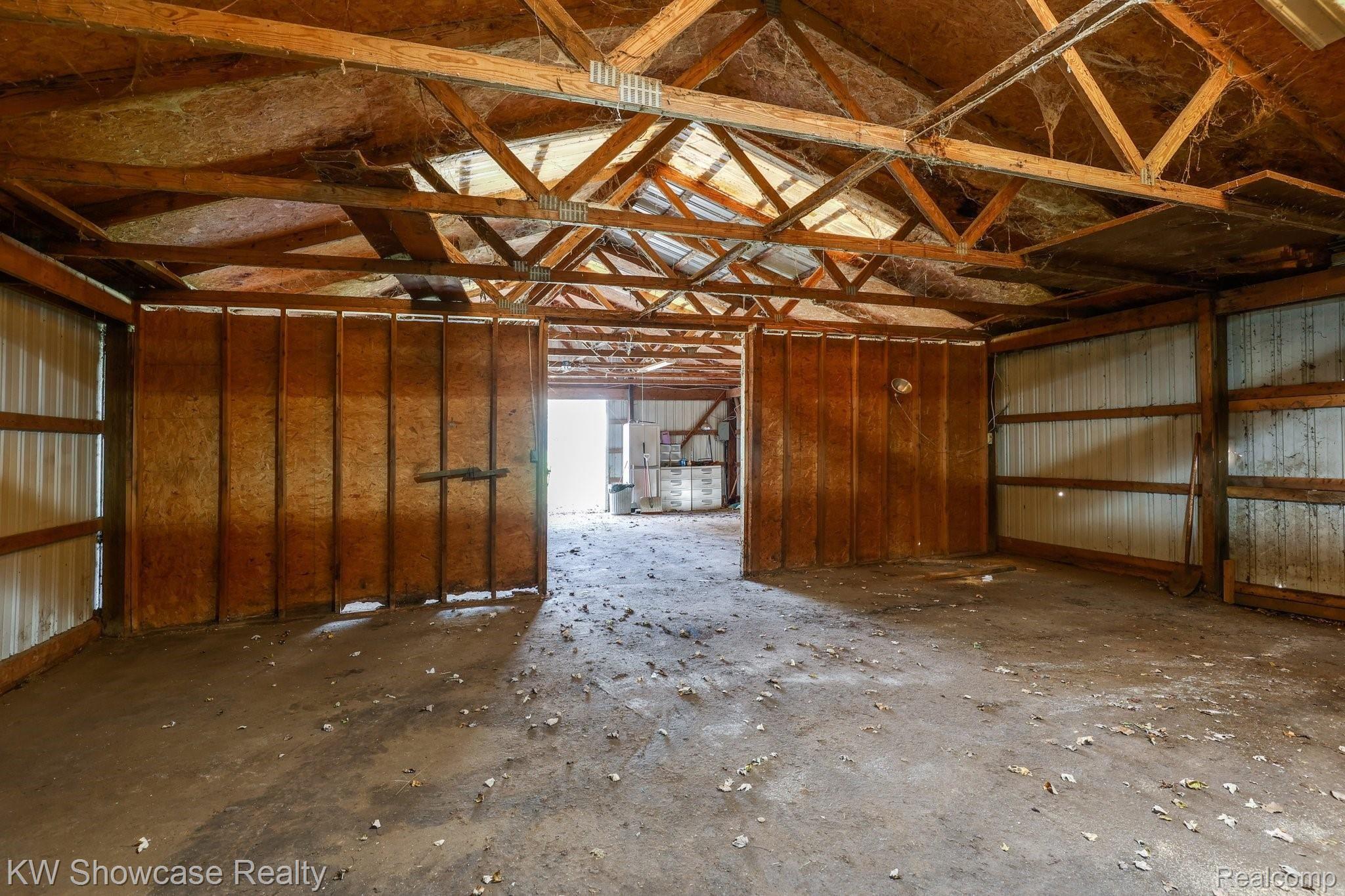 12382 Bunton Road Willis, MI 48191 - Photo 10 of 42 Inside view of pole barn.