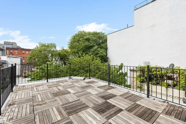 a street view with a large building
