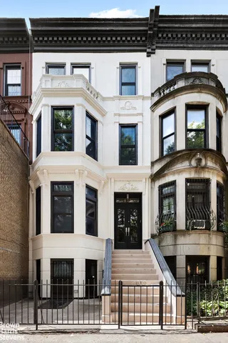 a front view of a building with a door