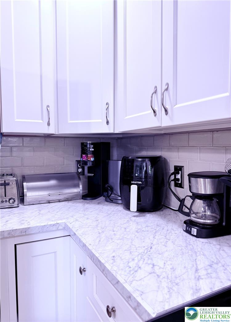 1275 Macada Road Bethlehem, PA 18017 - Photo 31 of 87 a kitchen with a stove and cabinets