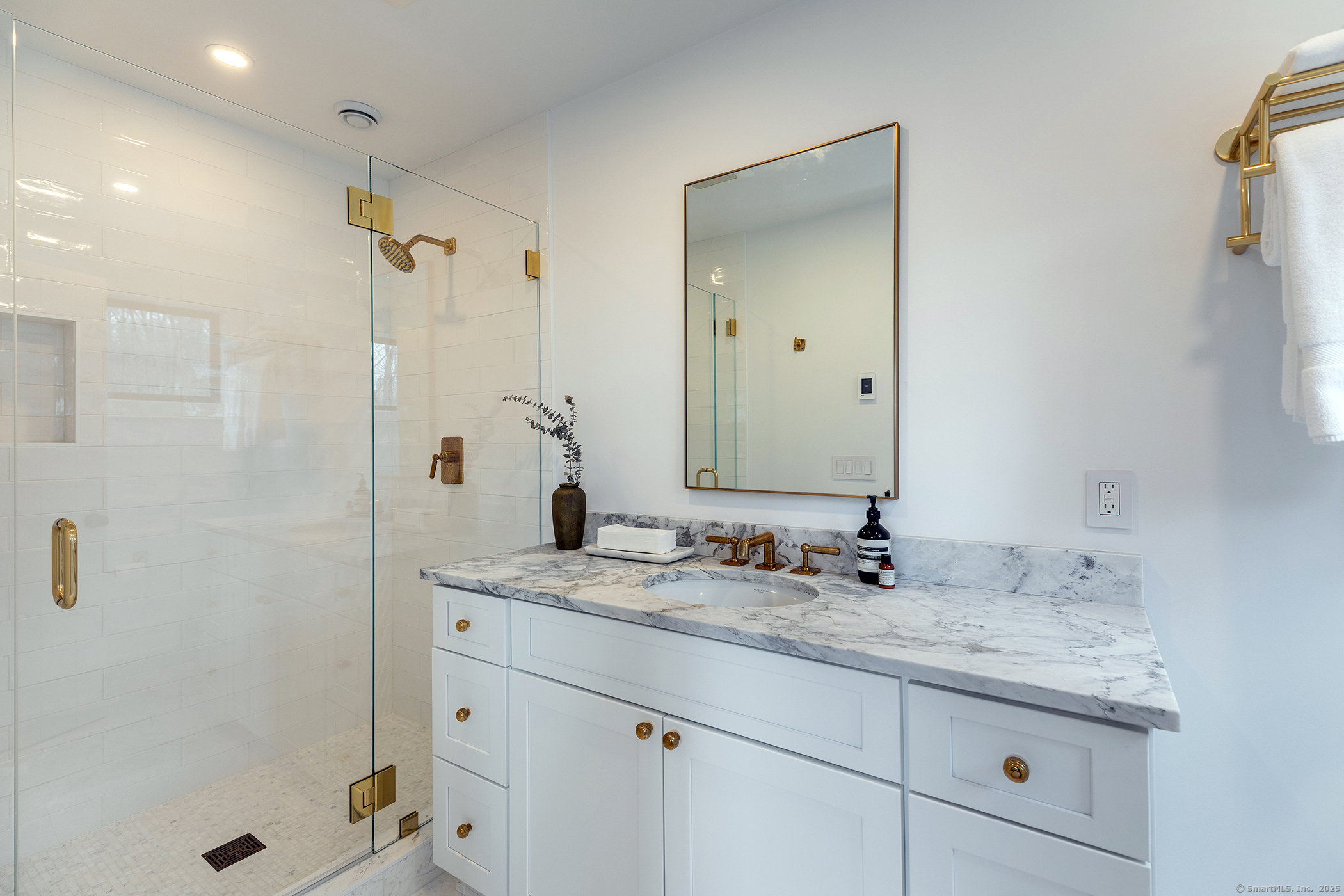 34 Old Roxbury Road Roxbury, CT 06783 - Photo 13 of 27 a bathroom with a granite countertop sink a mirror and shower