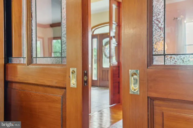 a kitchen with stainless steel appliances granite countertop a refrigerator a stove top oven a sink and dishwasher