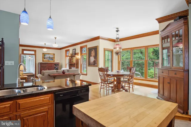 a front view of house with yard and outdoor seating
