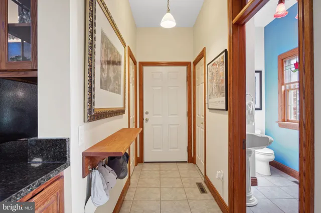 a backyard of a house with lots of green space and garden