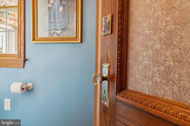 an aerial view of a house with yard