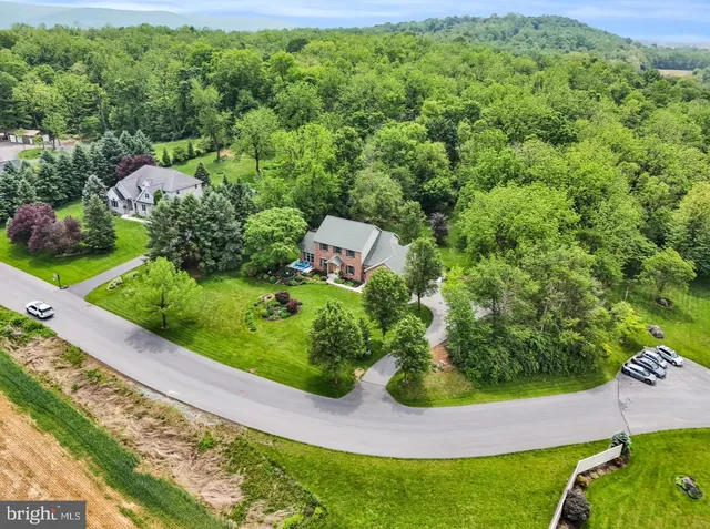 a front view of a house with yard