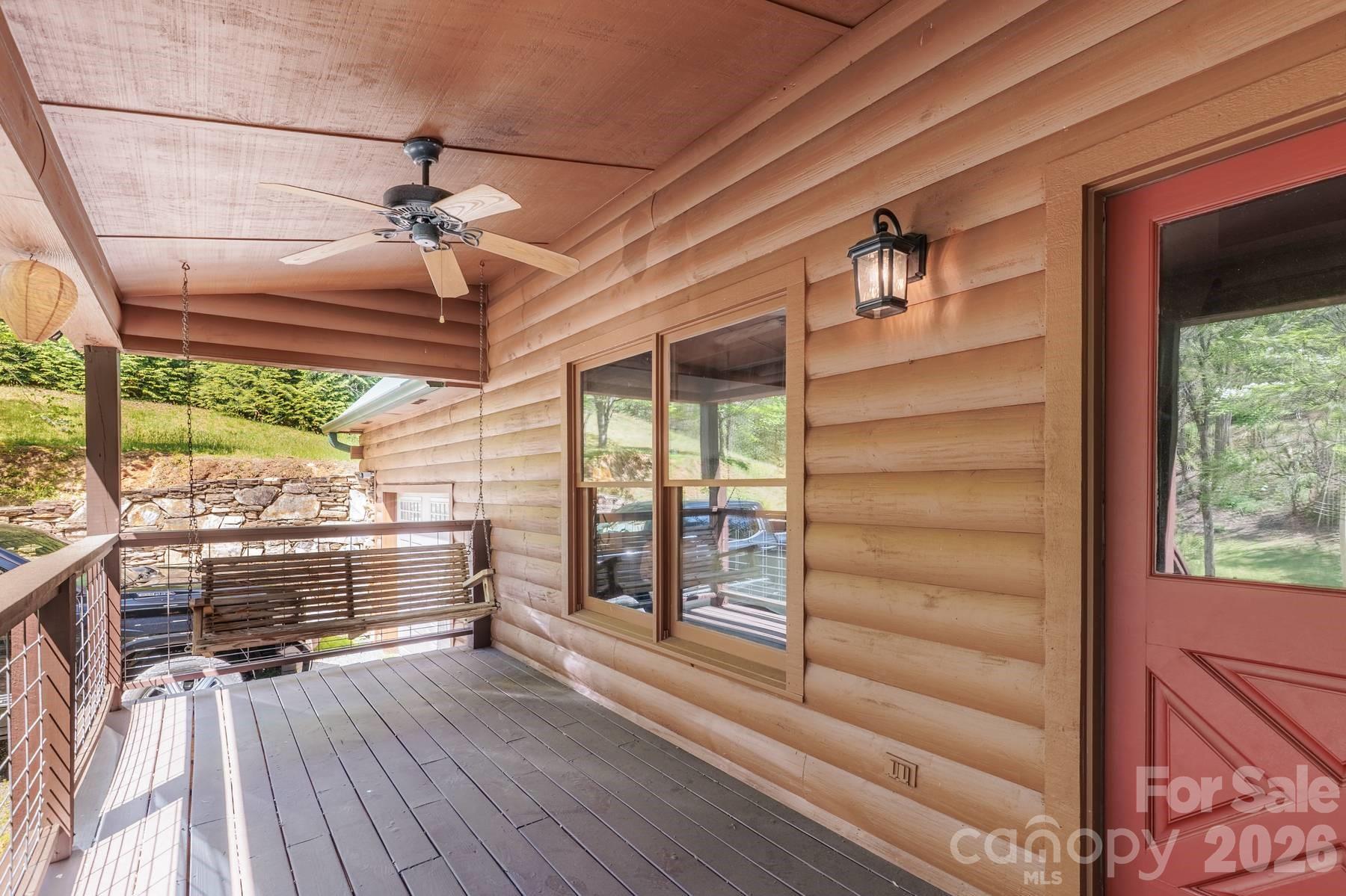 440 Huskey Road Bryson City, NC 28713 - Photo 4 of 42 a view of room with window and wooden floor