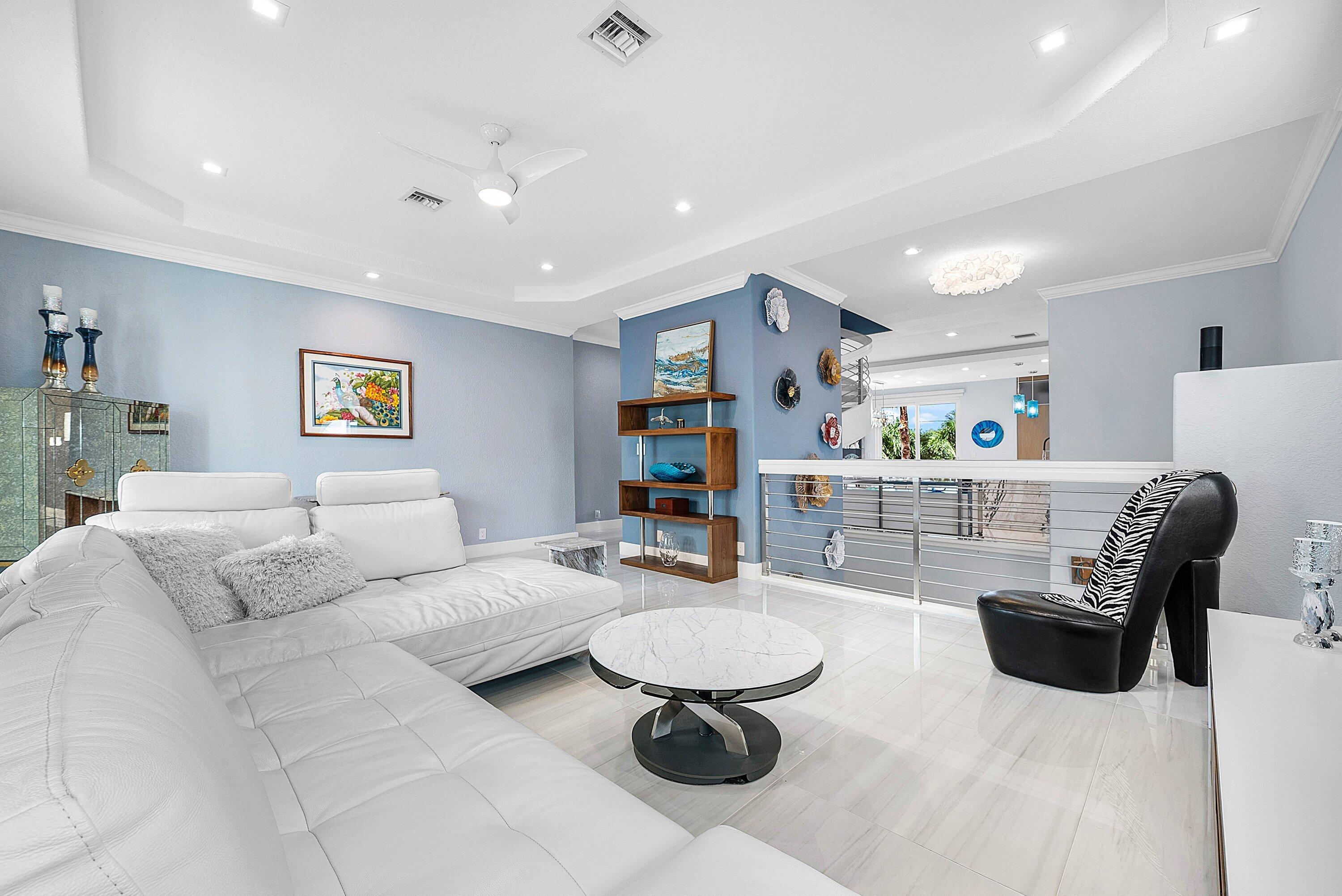 1792 Bay Drive, Unit 27 Pompano Beach, FL 33062 - Photo 13 of 51 a living room with furniture and a table