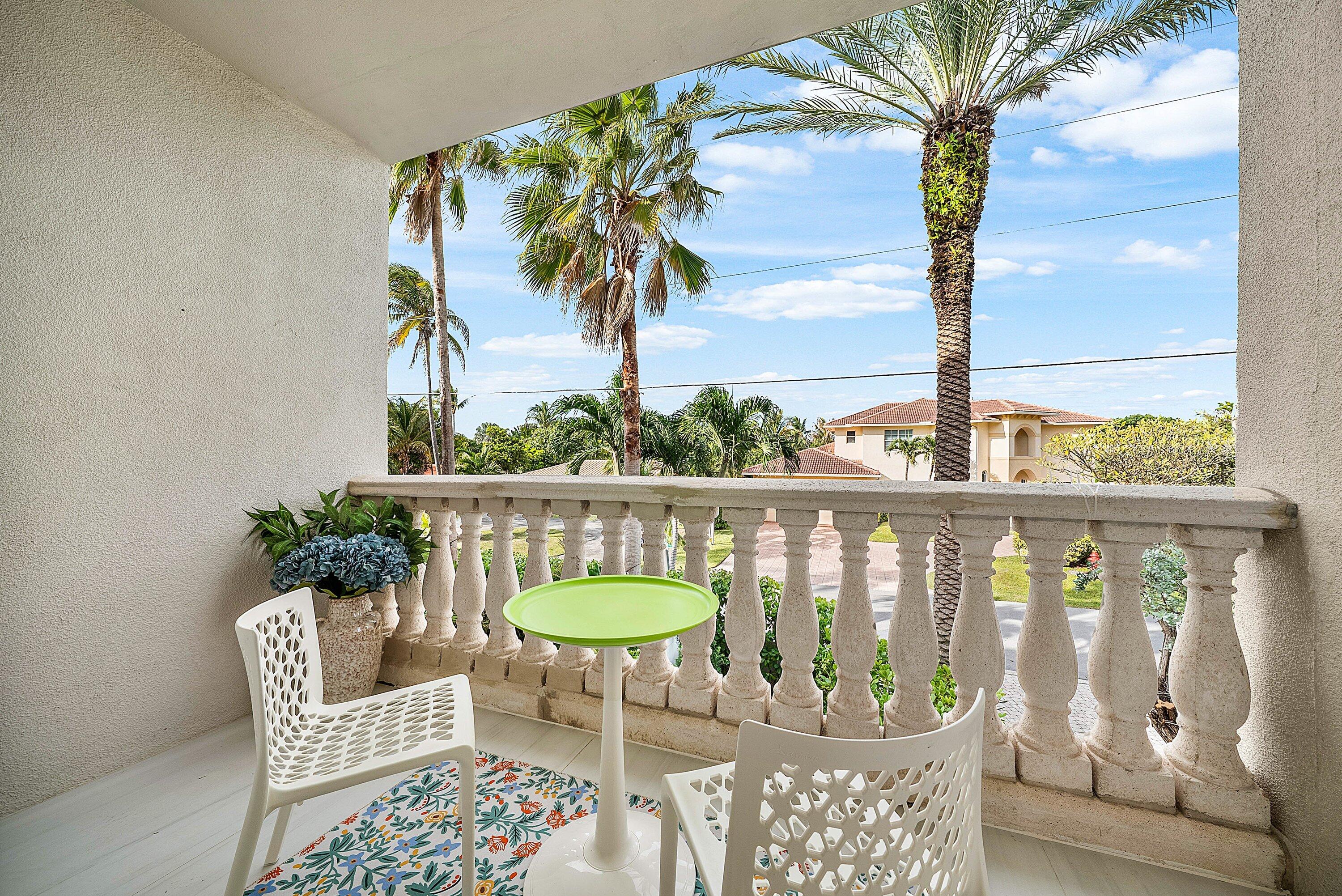 1792 Bay Drive, Unit 27 Pompano Beach, FL 33062 - Photo 16 of 51 a view of a chairs and table in patio