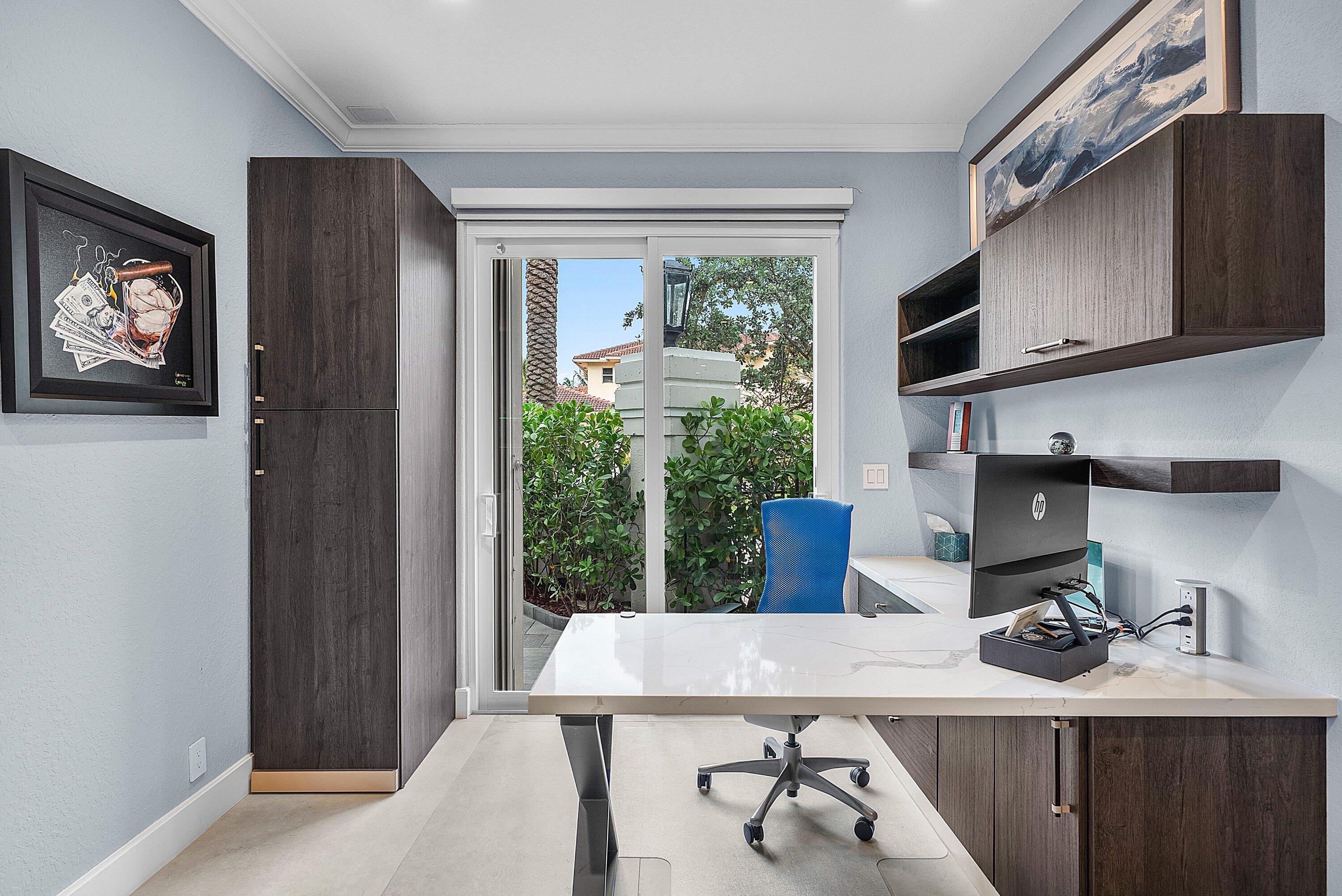 1792 Bay Drive, Unit 27 Pompano Beach, FL 33062 - Photo 20 of 51 a room with furniture a flat screen tv and a window