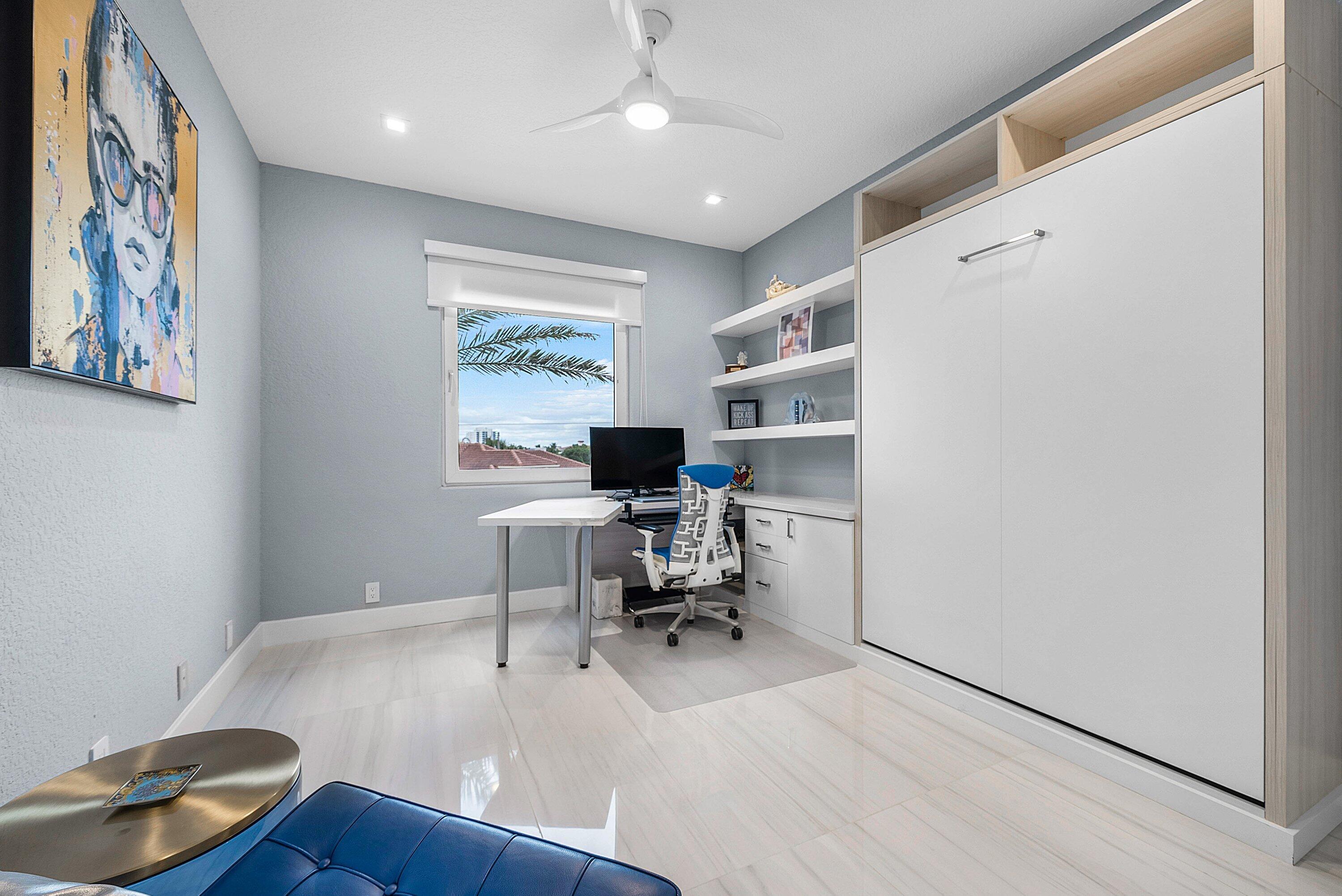 1792 Bay Drive, Unit 27 Pompano Beach, FL 33062 - Photo 31 of 51 a workspace with furniture and wooden floor