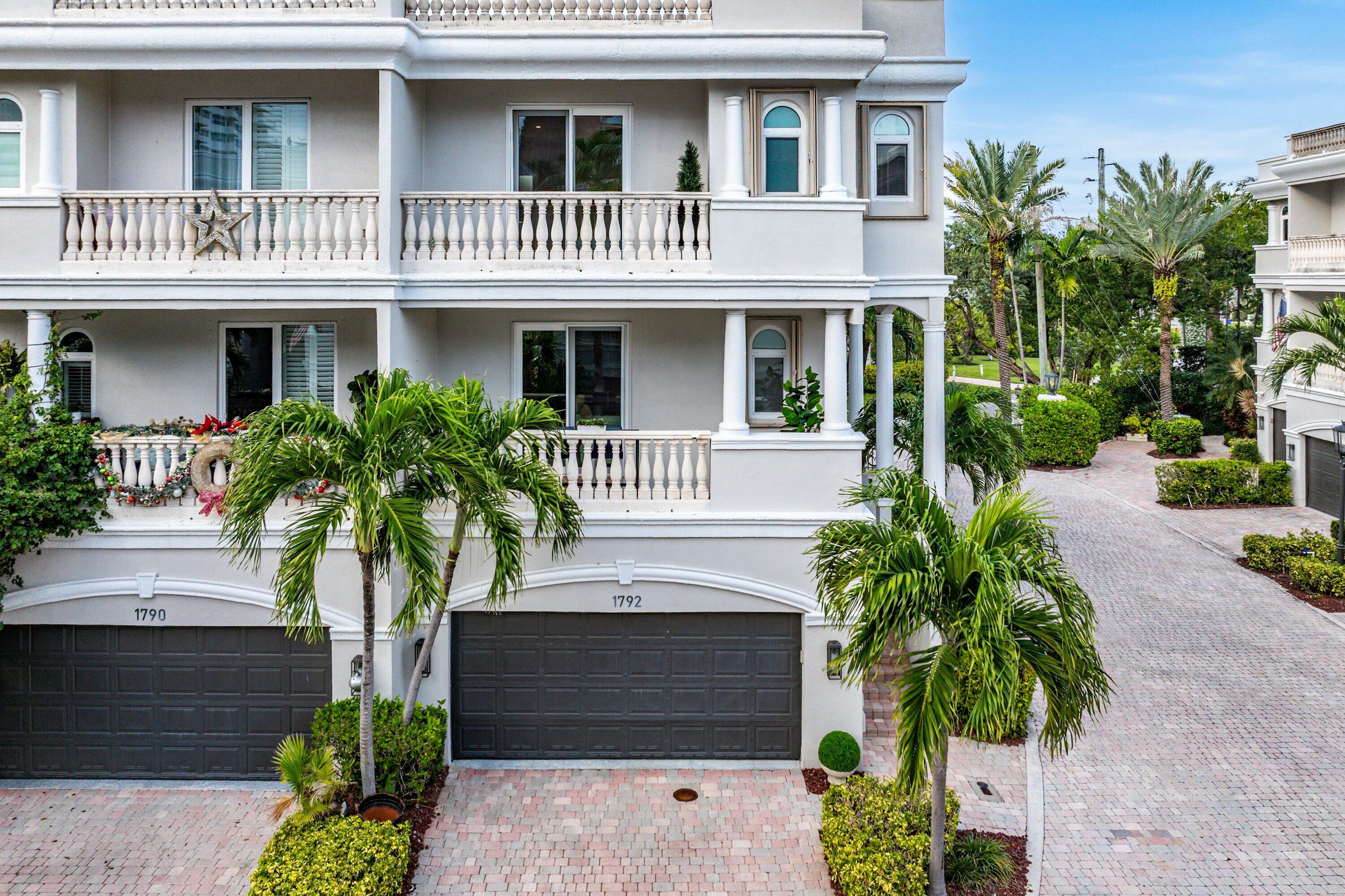 1792 Bay Drive, Unit 27 Pompano Beach, FL 33062 - Photo 40 of 51 a front view of a house with plants