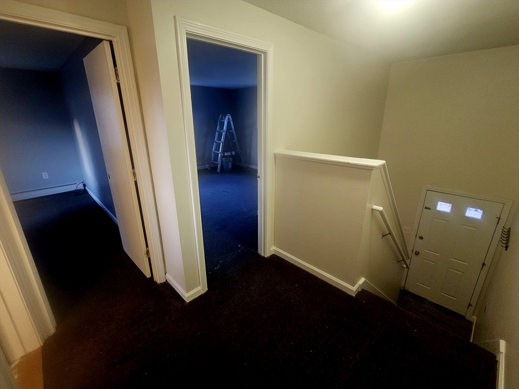 88 Albert Avenue, Unit 2 Springfield, MA 01151 - Photo 11 of 17 wooden floor in an empty room with a hallway