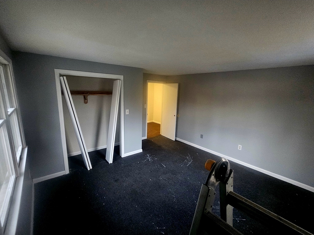 88 Albert Avenue, Unit 2 Springfield, MA 01151 - Photo 13 of 17 a view of an empty room with a window