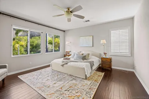 a bed room with bed and a window