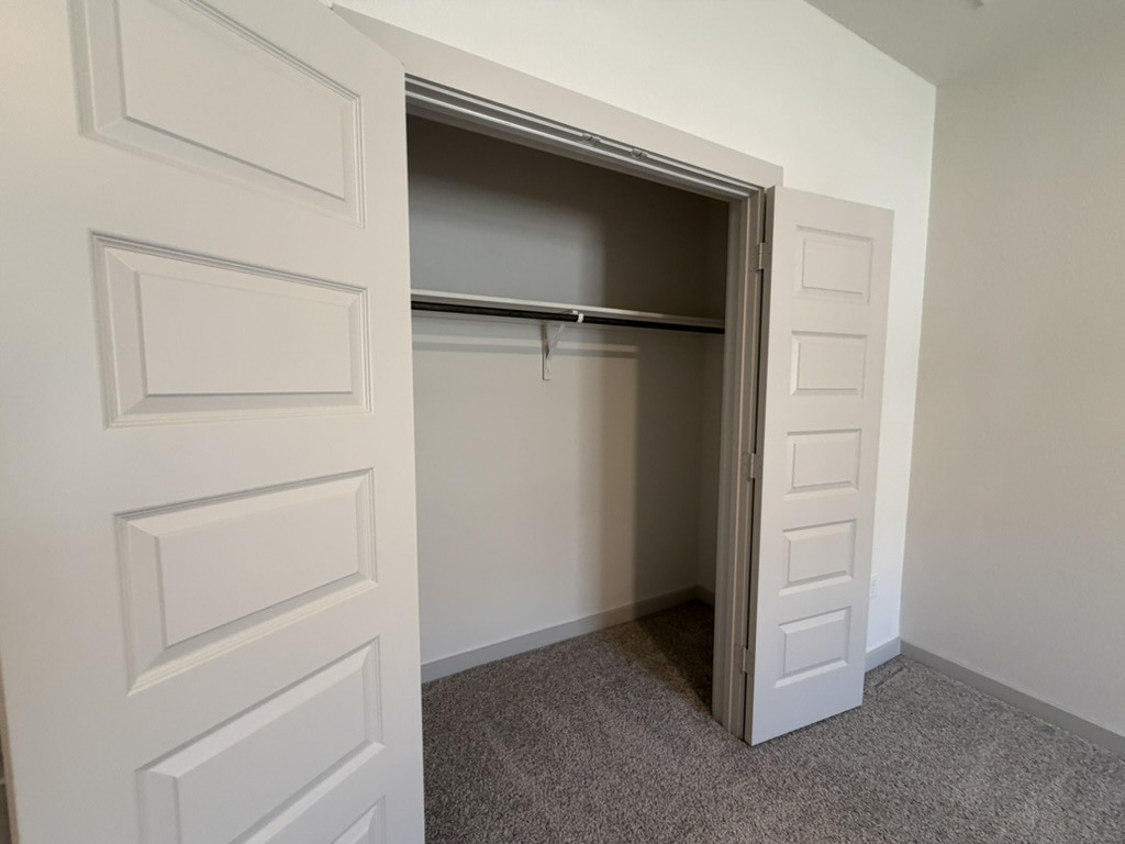 10708 Gonzales Ranger Pass Austin, TX 78754 - Photo 26 of 40 Functional closet space with ample room for storage and easy access.