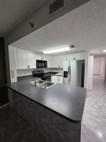 $2,175 | 9470 Tangerine Place, Unit 208, Davie, FL 33324