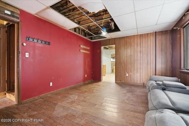 a view of livingroom with furniture and windows