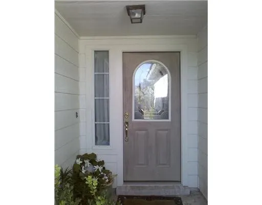 a view of a hallway with windows