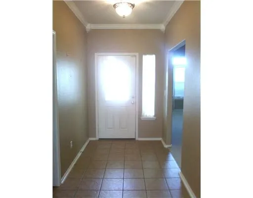 a view of staircase with lots of white walls