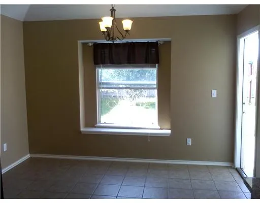 a view of empty room with window