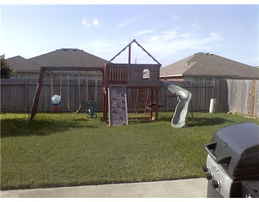 1122 La Mirada Portland, TX 78374 - Photo 10 of 10 a front view of a house with garden