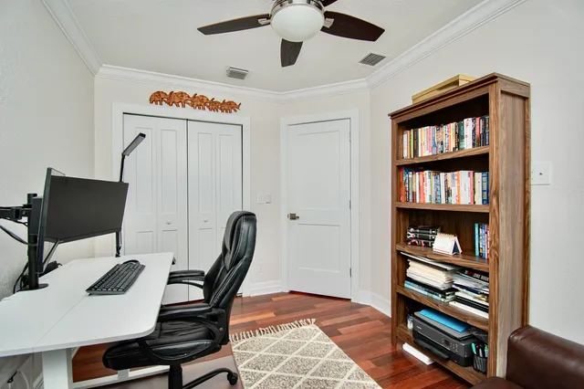 a view of a workspace with furniture