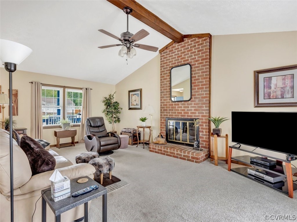 7713 Drexelbrook Road Chesterfield, VA 23832 - Photo 6 of 22 a living room with furniture and a flat screen tv