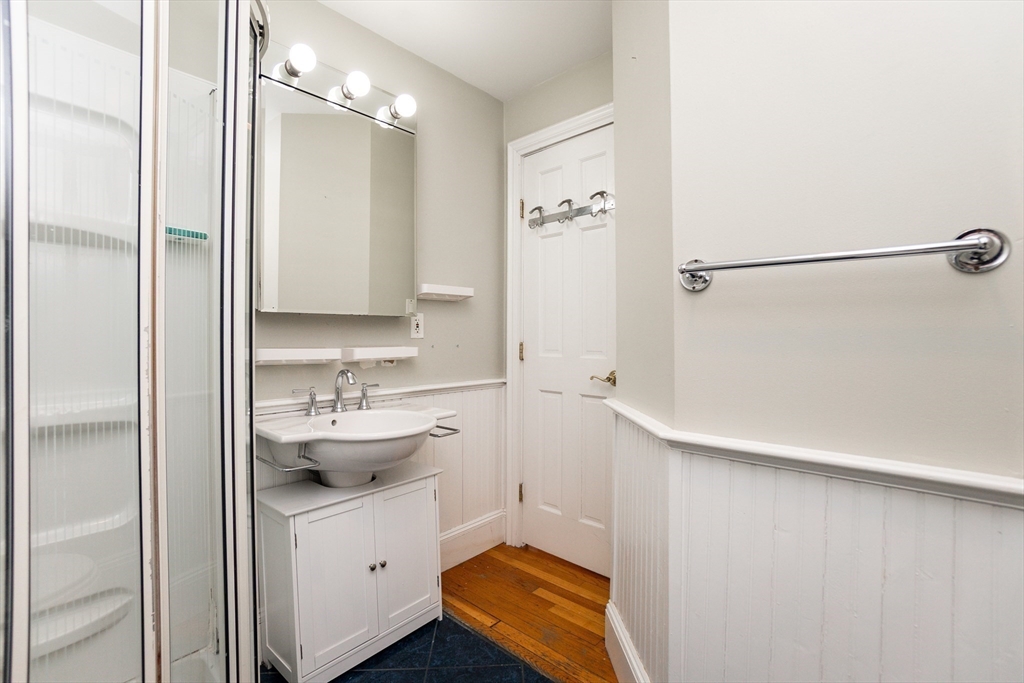 41 Worcester Square, Unit 5 Boston, MA 02118 - Photo 15 of 17 a bathroom with a sink and a mirror