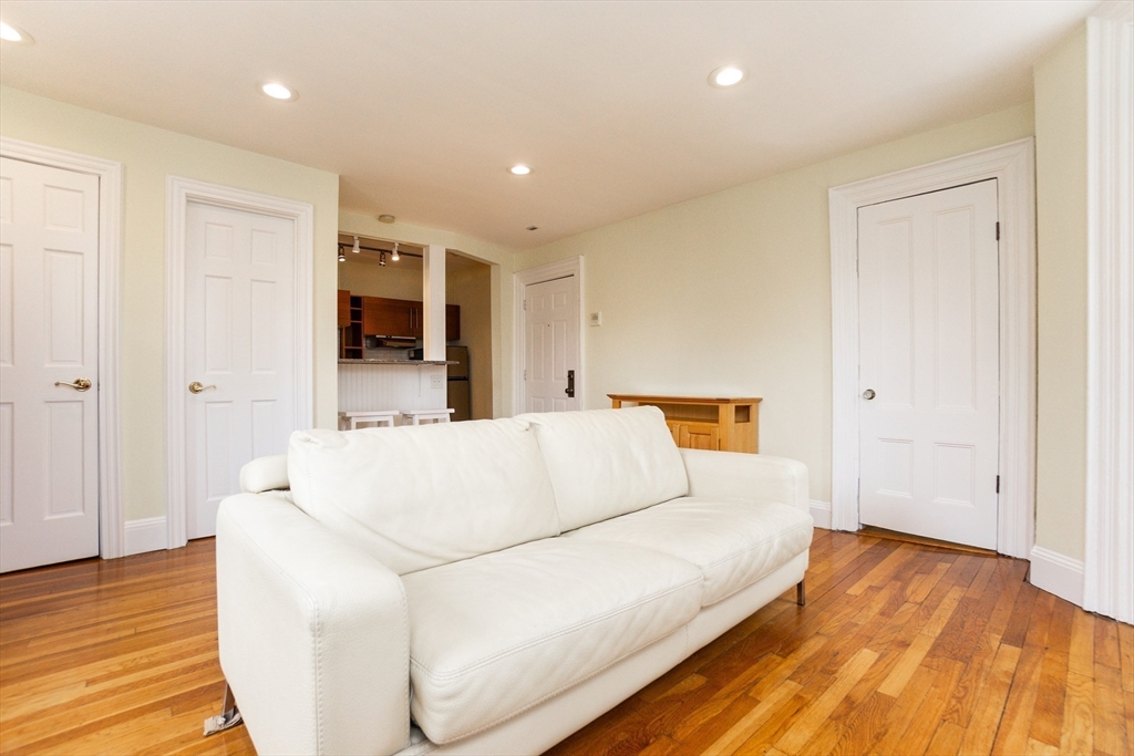 41 Worcester Square, Unit 5 Boston, MA 02118 - Photo 8 of 17 a large white bed in a white room