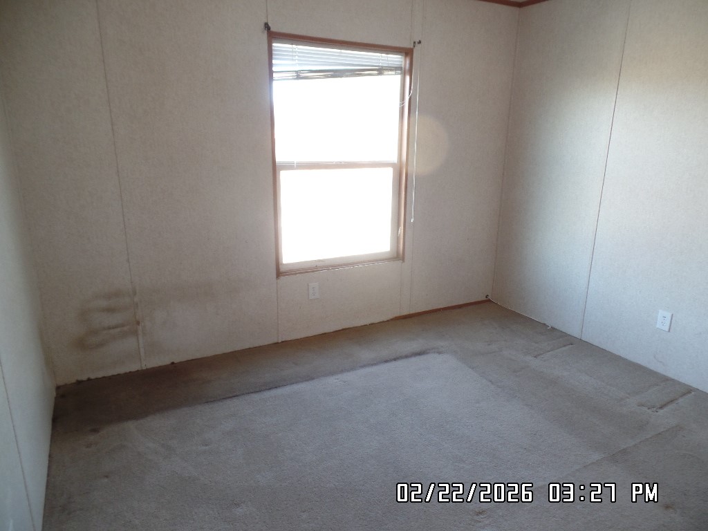 686 Ramar Road Bullhead City, AZ 86442 - Photo 20 of 22 an empty room with a window