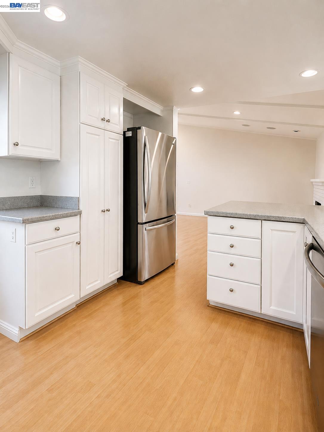 2516 Dos Rios Drive San Ramon, CA 94583 - Photo 8 of 14 a kitchen with cabinets and a refrigerator