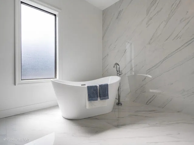 a view of a balcony with wooden floor and stairs