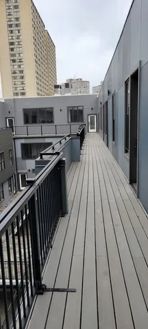 a picture of a bench in the window