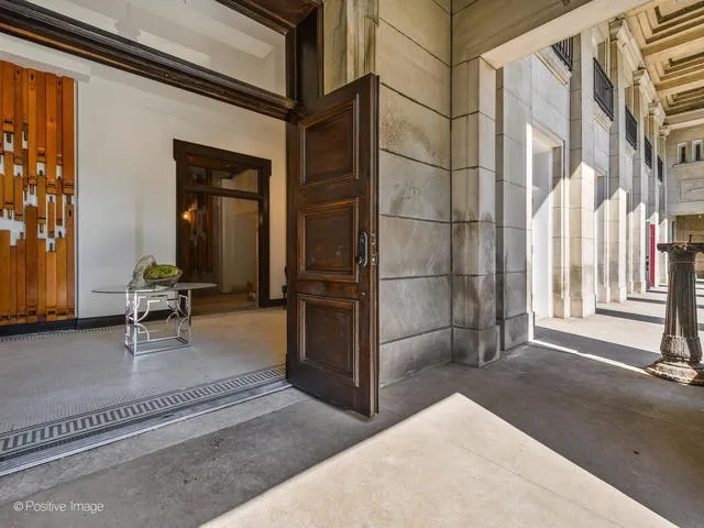a view of a living room and bathroom