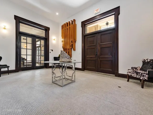 a view of a livingroom with furniture and window