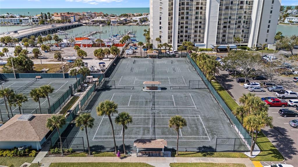 9425 Blind Pass Road, Unit 1006 St. Pete Beach, FL 33706 - Photo 41 of 45 an aerial view of multiple houses