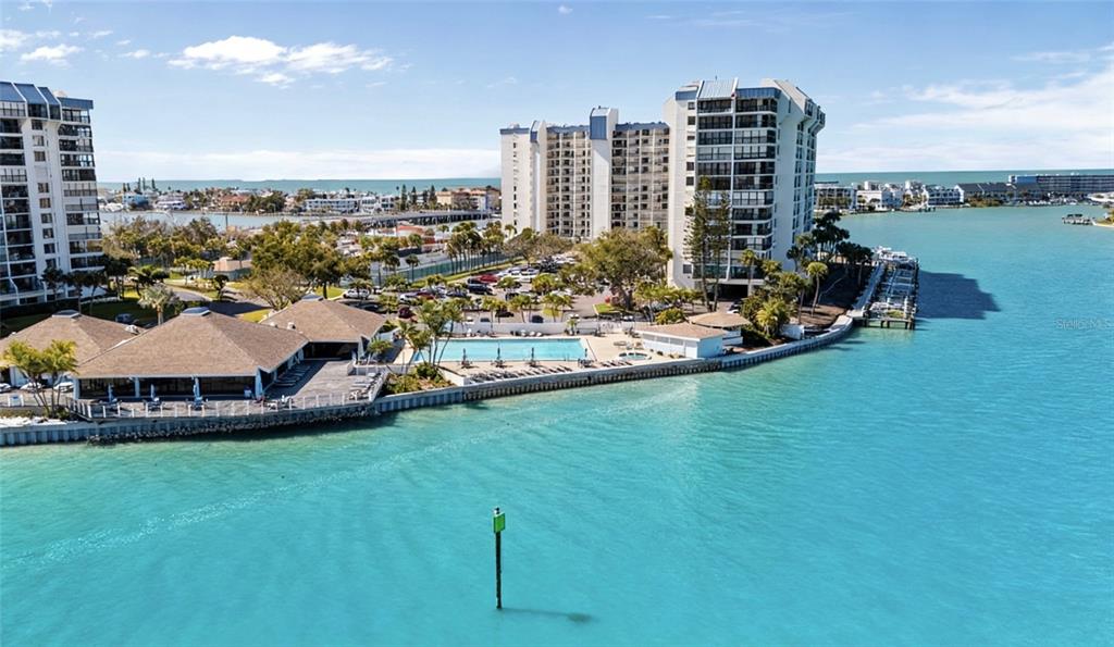 9425 Blind Pass Road, Unit 1006 St. Pete Beach, FL 33706 - Photo 42 of 45 a view of a city with tall buildings