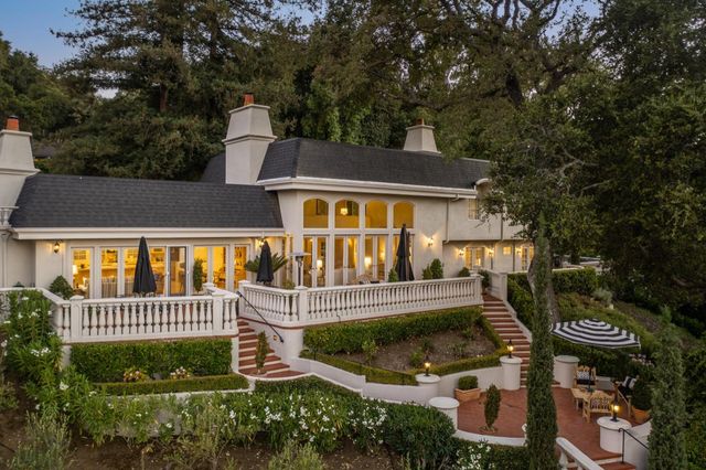 front view of a house with a small yard