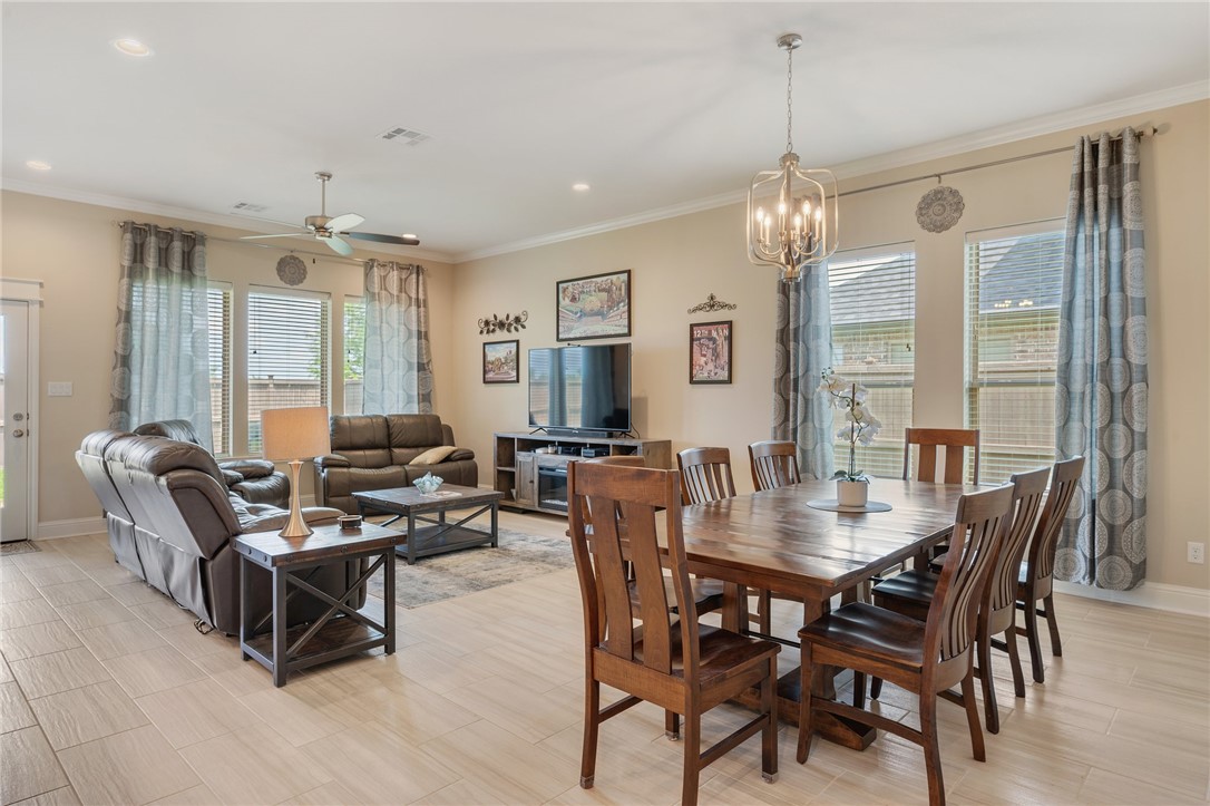 4261 Harding Way Bryan, TX 77802 - Photo 11 of 27 a view of a dining room with furniture window and outside view